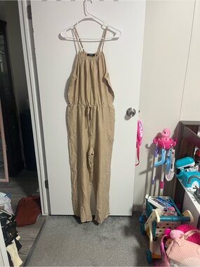 Beige Sleeveless Drawstring Jumpsuit With Pockets